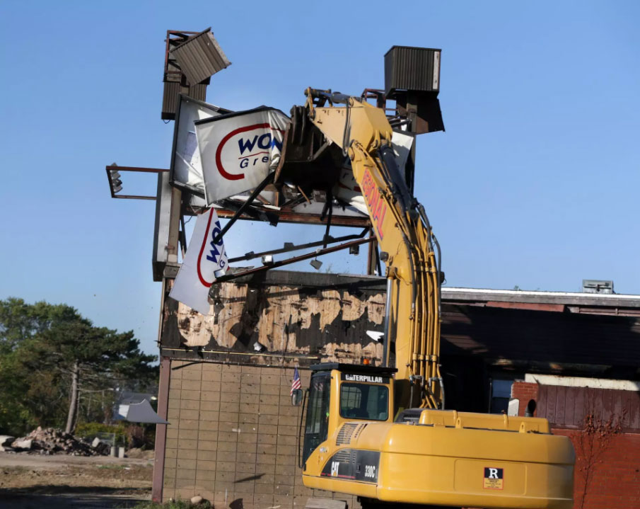 Wonderland Greyhound Park sign being destroyed